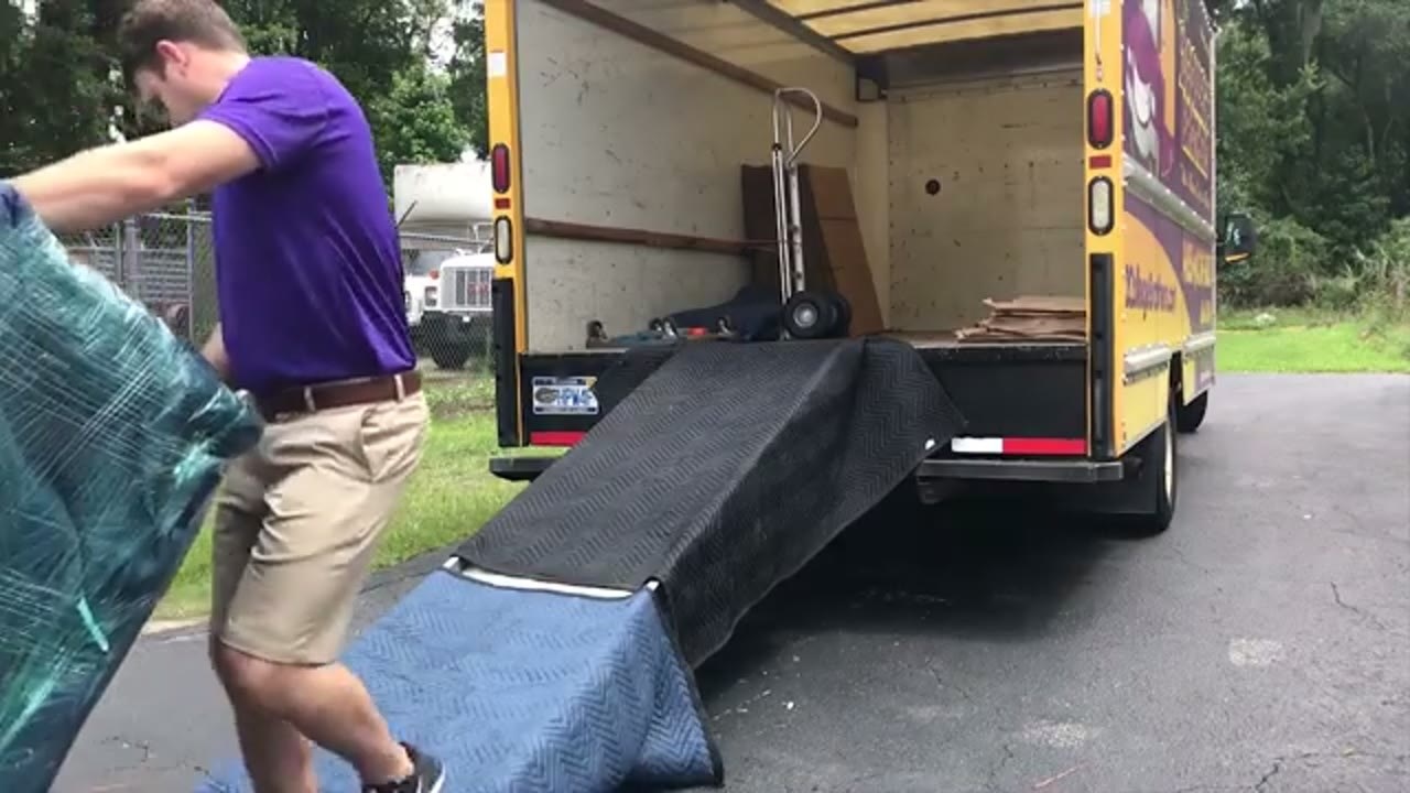 Up and Coming Moving and Labor crew loading a truck in Lexington, Kentucky